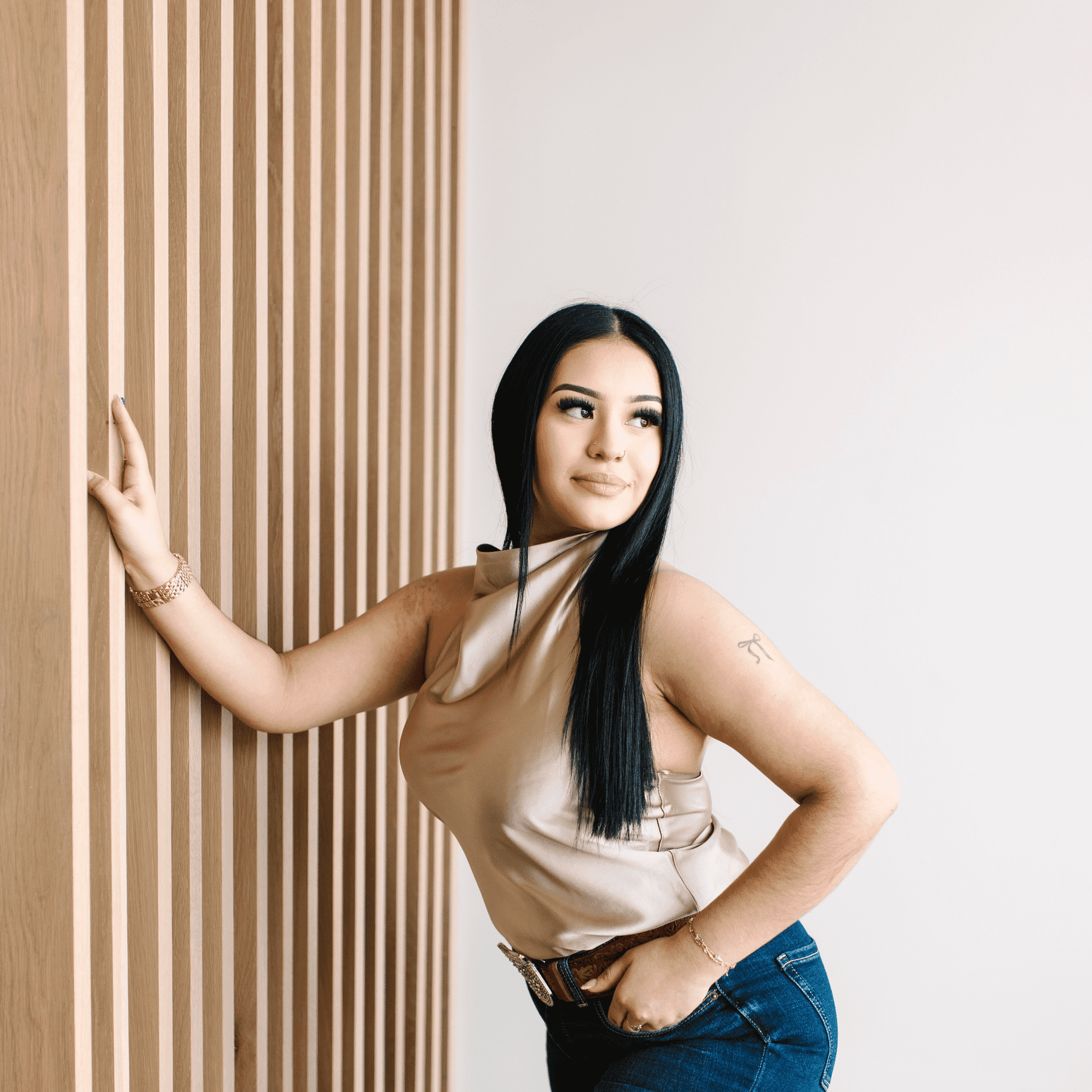 Portrait of Michelle, a professional stylist at The Collective Beauty Studio, showcasing their expertise and style.